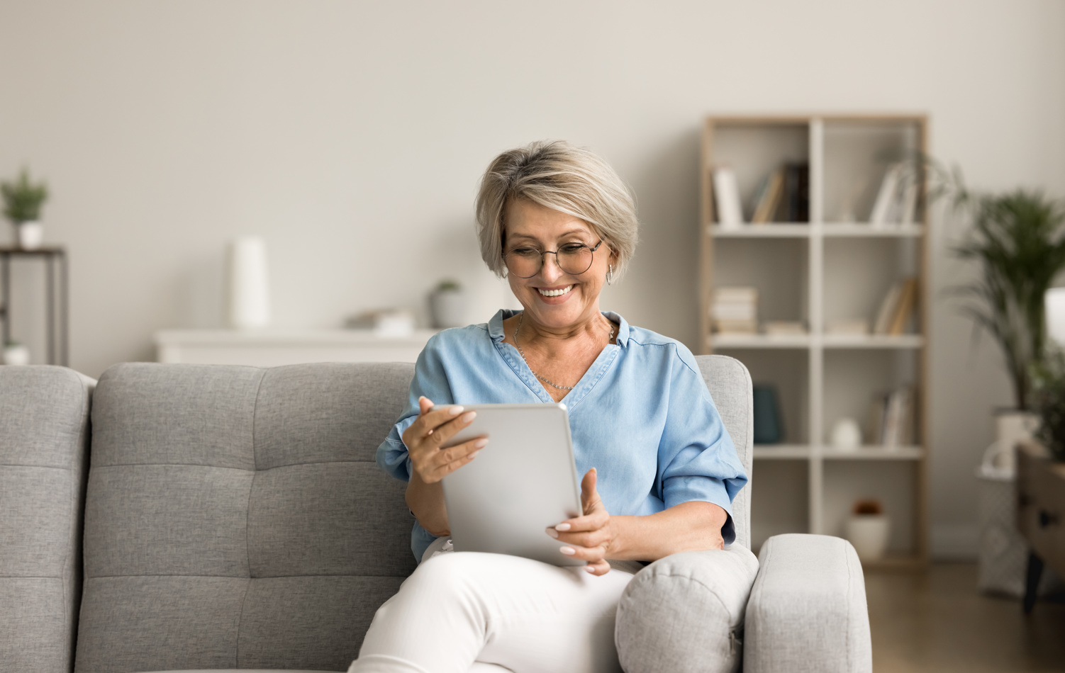 Woman sat on a sofa