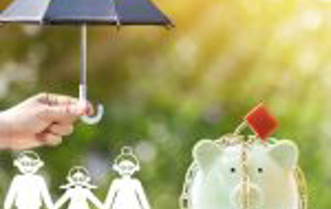 Someone holding a small umbrella over a family and a lock piggy bank