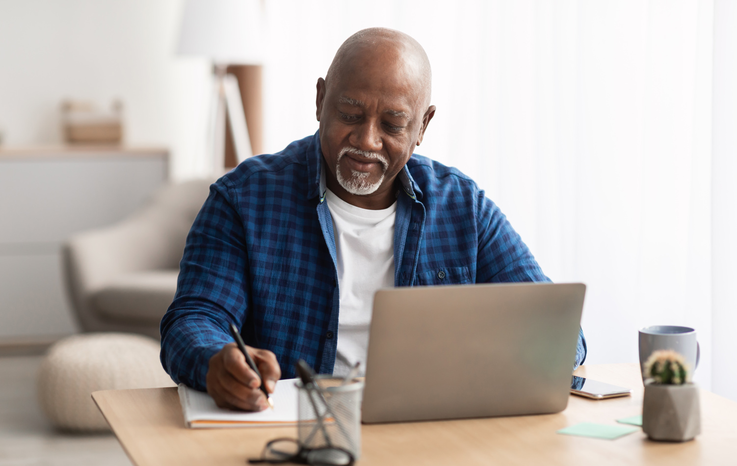 A man looking at his pension checklist 